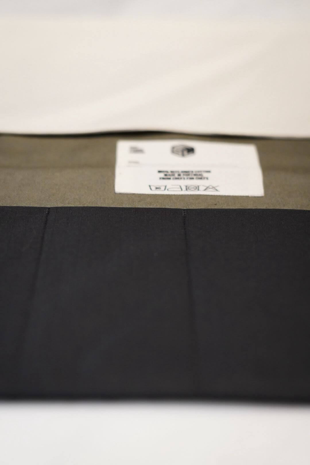 Demi Knife Sleeper in off-white, black and olive reclaimed canvas — Edit Studio London